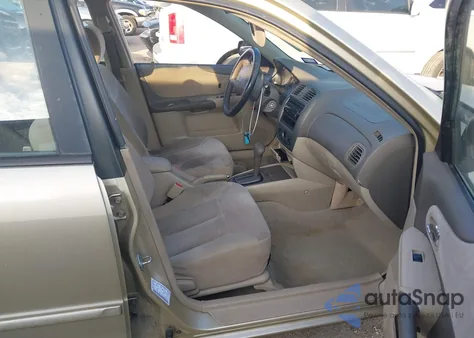 2001 Mazda Protege Es/Lx z USA, uszkodzony, nr VIN JM1BJ225910412686